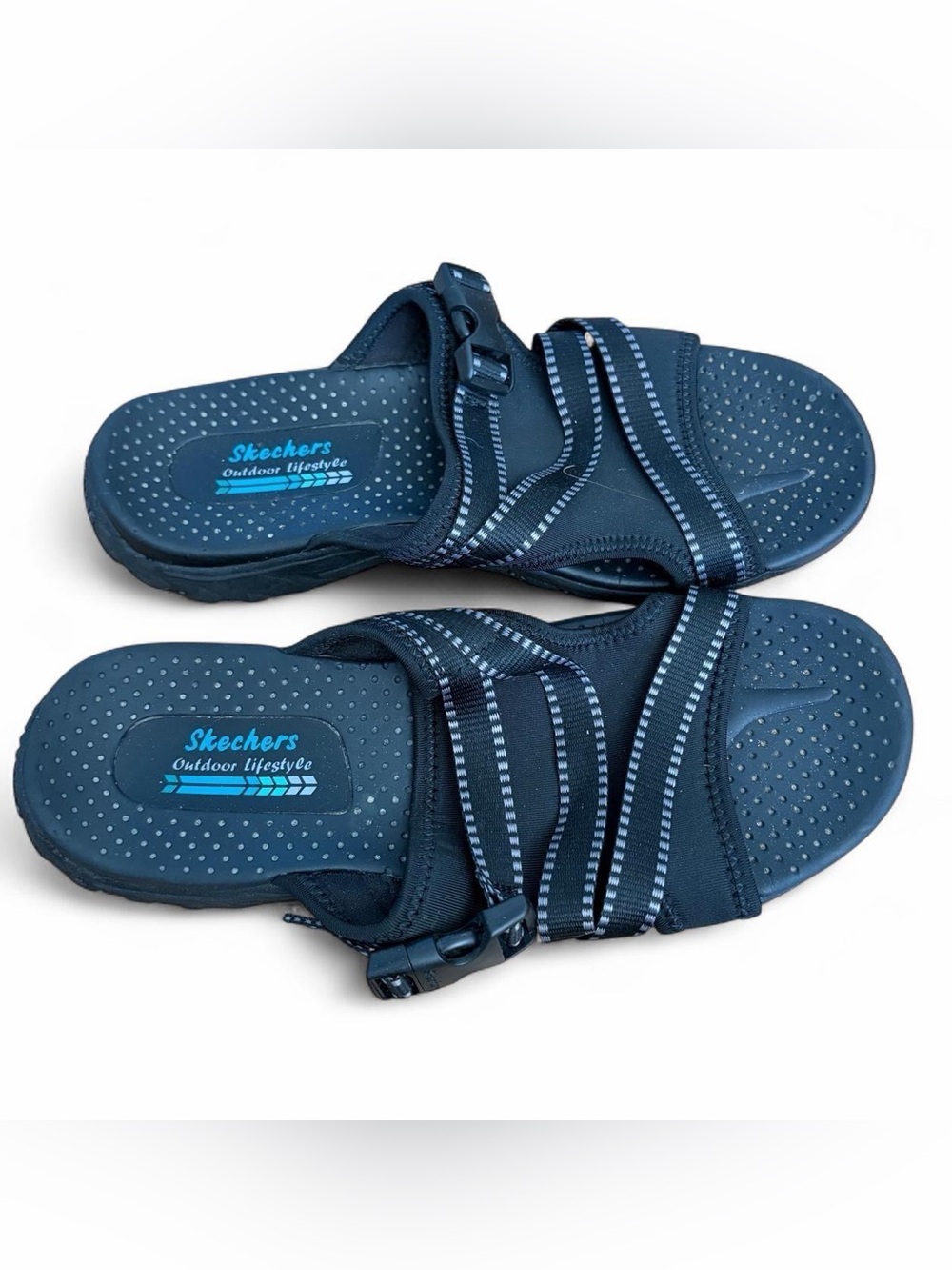 Skechers woman’s black comfort slides w white stripes Sz 8